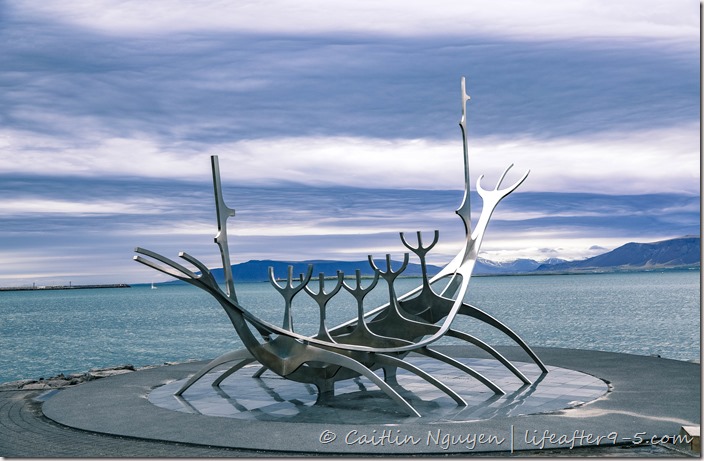Sun Voyager the famous metallic boat sculpture in Reykjavic against stormy sky