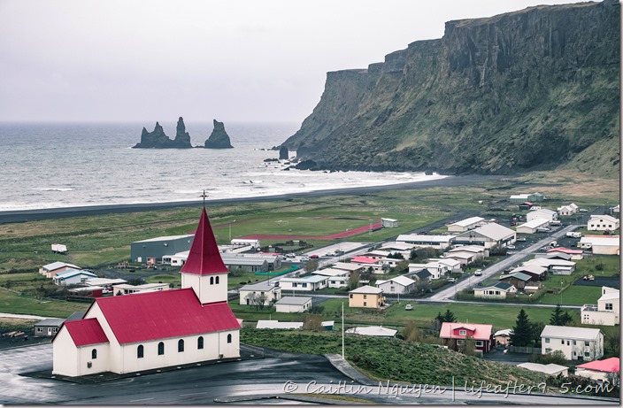 View of the town of Vik from above with church in foreground