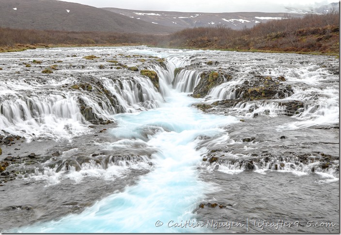 Thousand of icy blue runlets of Bruarfoss