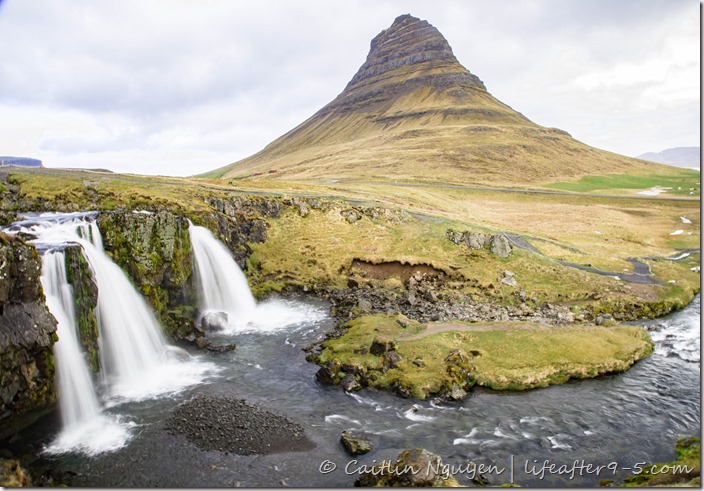 Kirkjufellsfoss with Kirkjufells mountain in the background