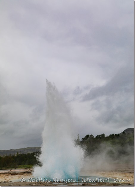 Strokkur geyser exploding out of the ground